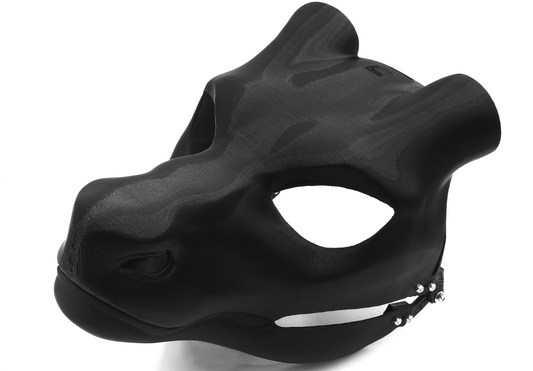 A 3D printed black fursuit head base designed to resemble a dragon's head.