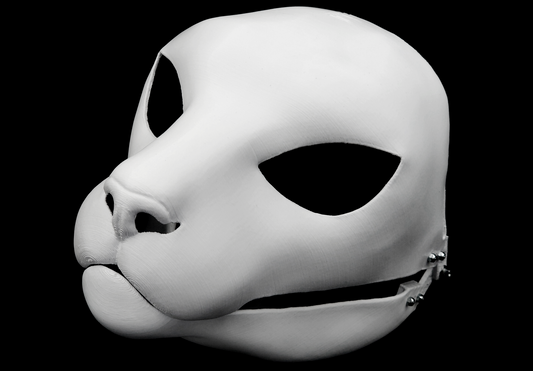 Photo showing a white, plastic 3D printed small feline fursuit head base complete with metal hardware at a 3/4 angle against a black background.