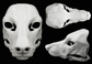 Photo collage showing a white, plastic 3D printed poodle dog fursuit head base complete with metal hardware featuring a front, side, and back view against a black background.