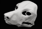 Photo showing a white, plastic 3D printed poodle dog fursuit head base complete with metal hardware at a 3/4 angle against a black background.