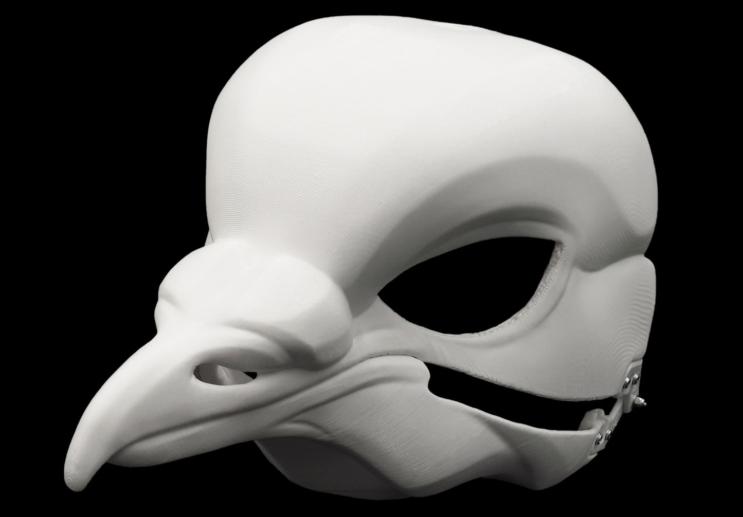 Photo showing a white, plastic 3D printed pigeon fursuit head base complete with metal hardware at a 3/4 angle against a black background.