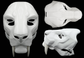 Photo collage showing a white, plastic 3D printed smilodon fursuit head base complete with metal hardware featuring a front, side, and top view against a black background.